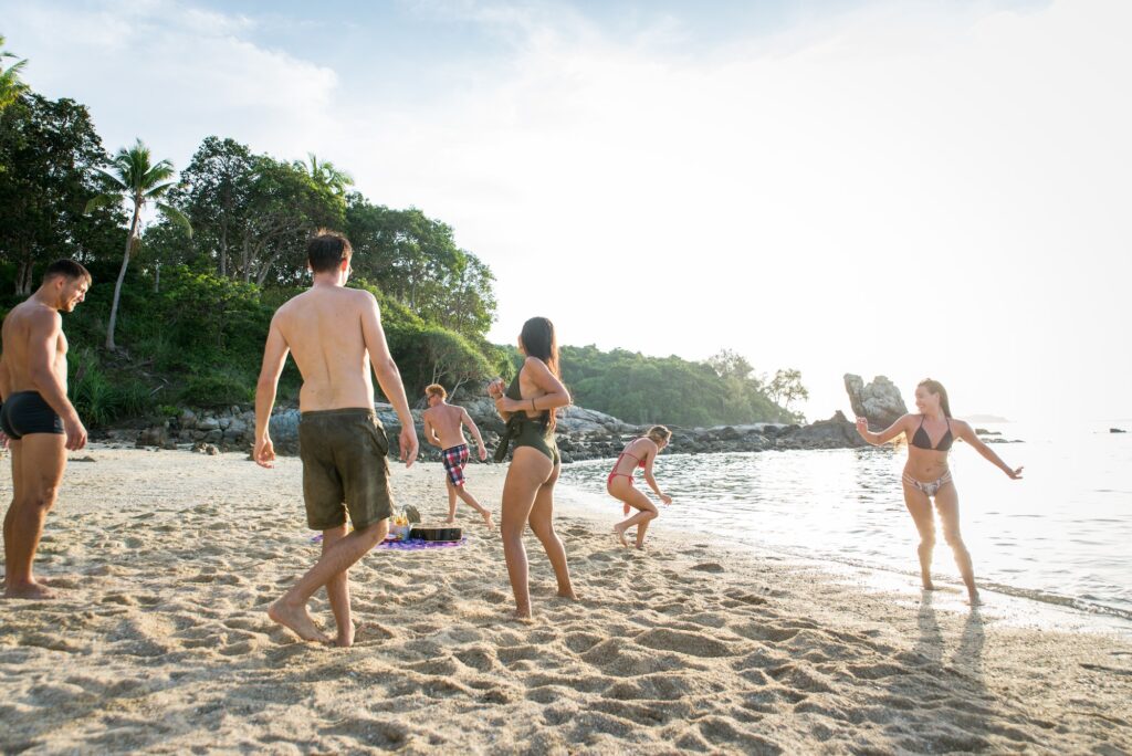 Group of happy friends on a tropical island