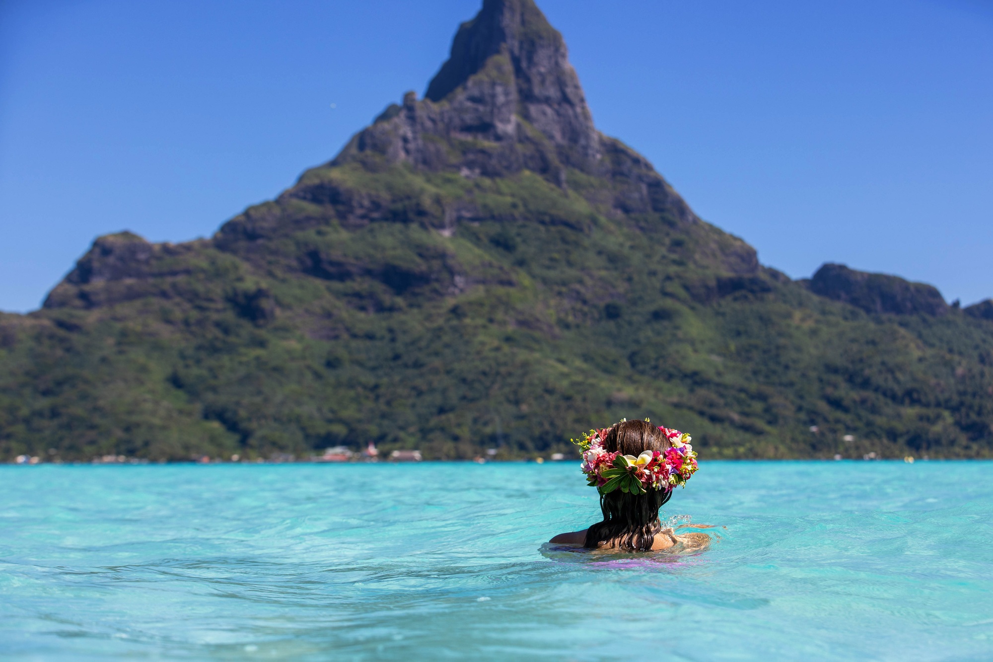 Woman wearing floral crown in Bora Bora