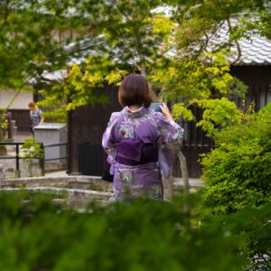 Women tourism wear a traditional dress called Kimono for travelling in Kyoto
