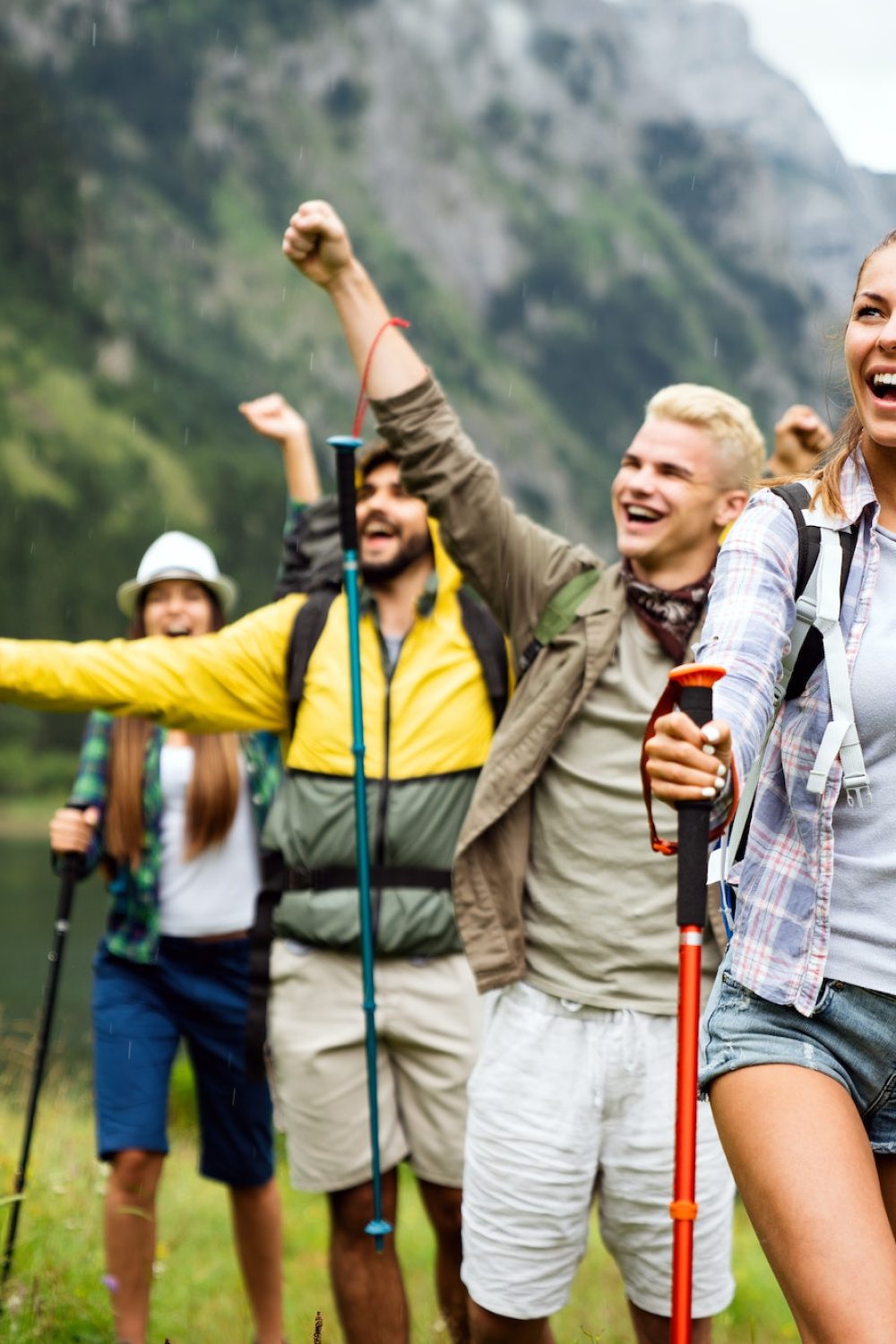 Group of friends on a hiking, camping trip in the mountains